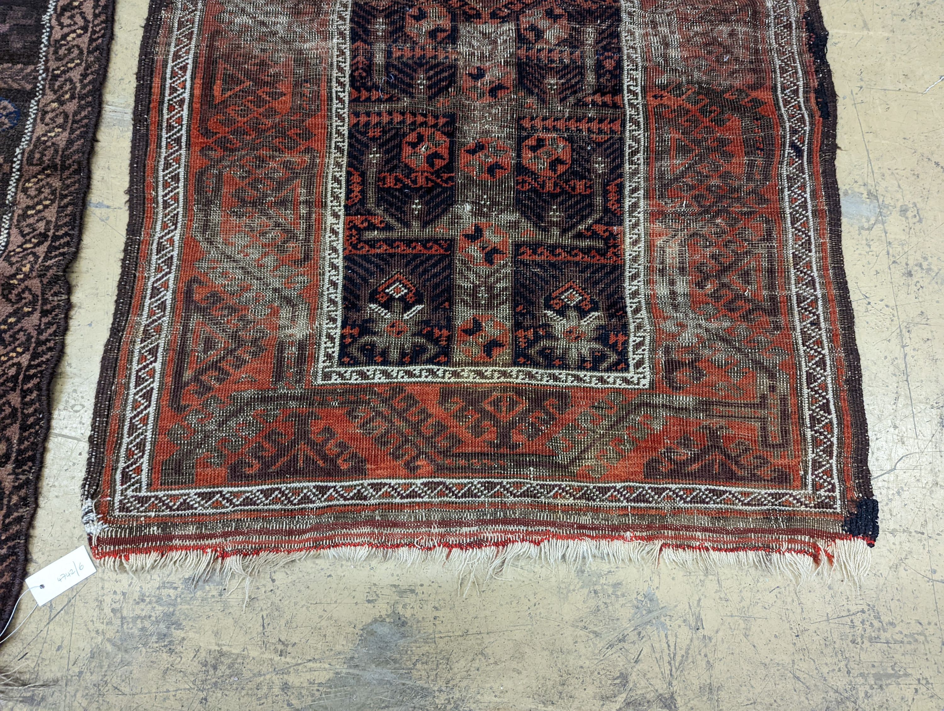 Two Caucasian geometric polychrome rugs, largest 190 x 96cm